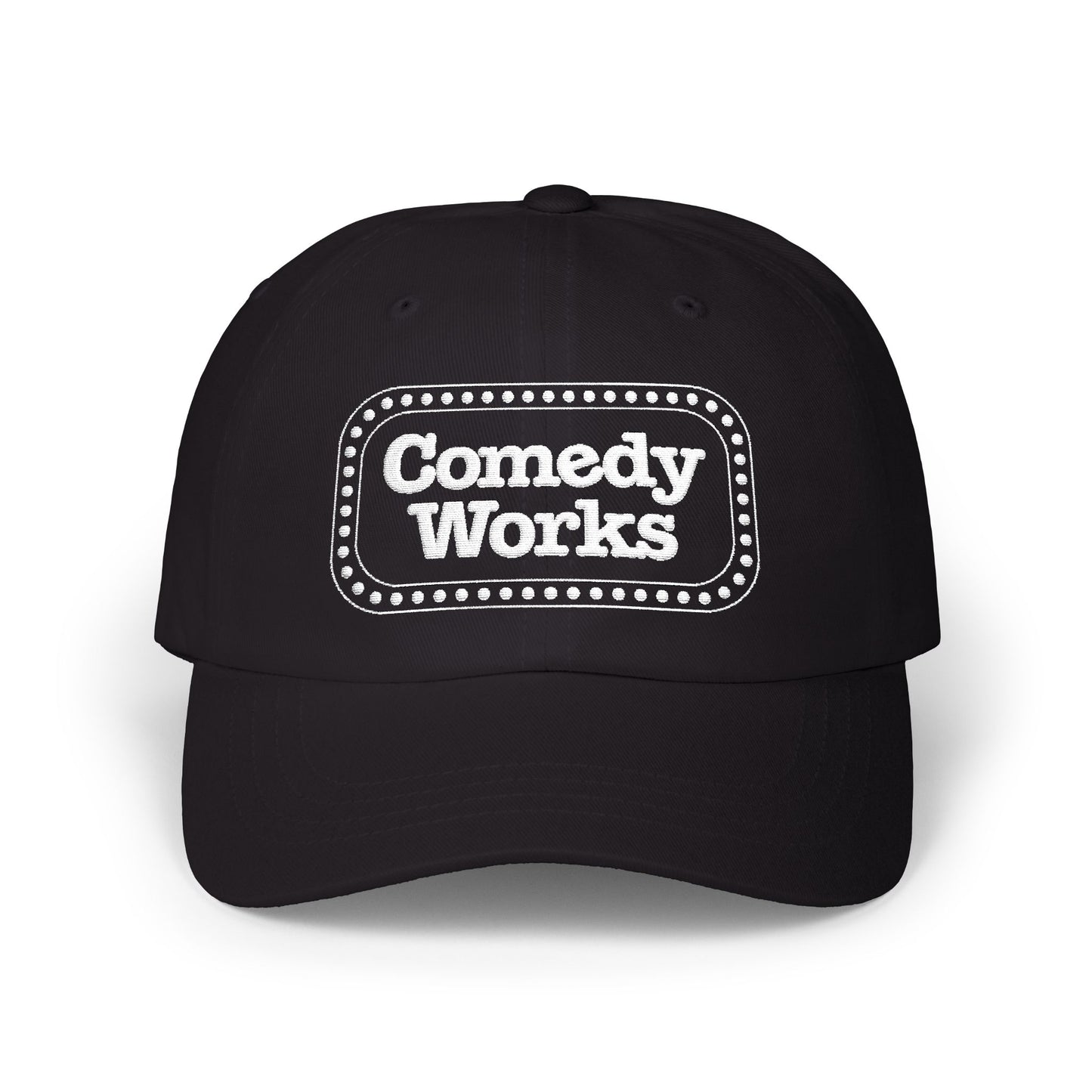 Black cap with 'Comedy Works' printed on a white background