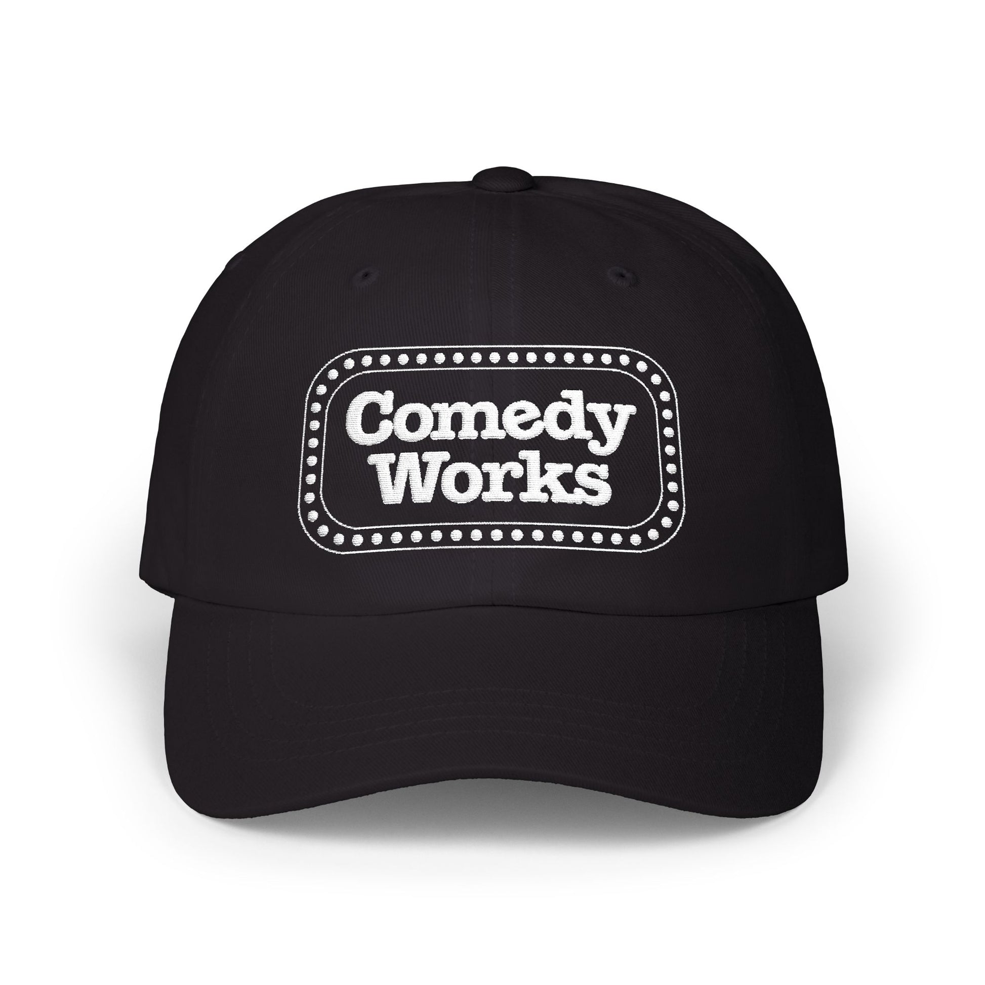 Black cap with 'Comedy Works' printed on a white background